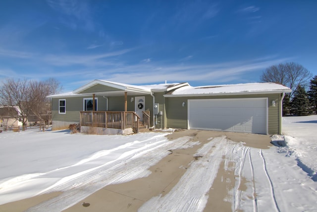 view of front of house featuring a porch and a garage