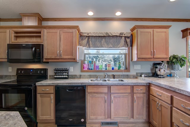 kitchen with visible vents, crown molding, light countertops, black appliances, and a sink