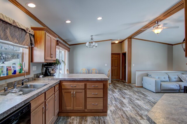 kitchen featuring wood finished floors, a peninsula, ornamental molding, a sink, and black dishwasher