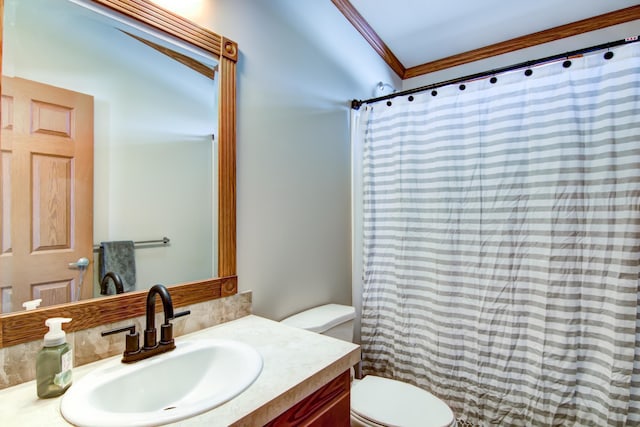 full bathroom featuring vanity, crown molding, curtained shower, and toilet