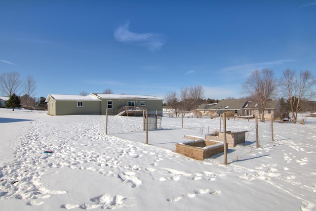 view of yard covered in snow