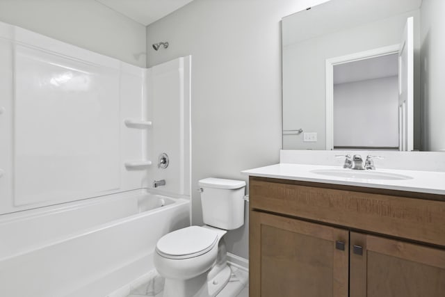 full bath with marble finish floor, tub / shower combination, vanity, and toilet