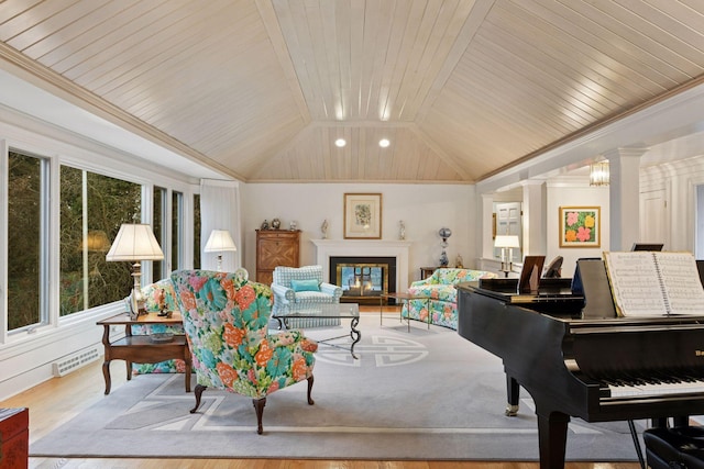 living room featuring visible vents, a glass covered fireplace, decorative columns, wood ceiling, and vaulted ceiling