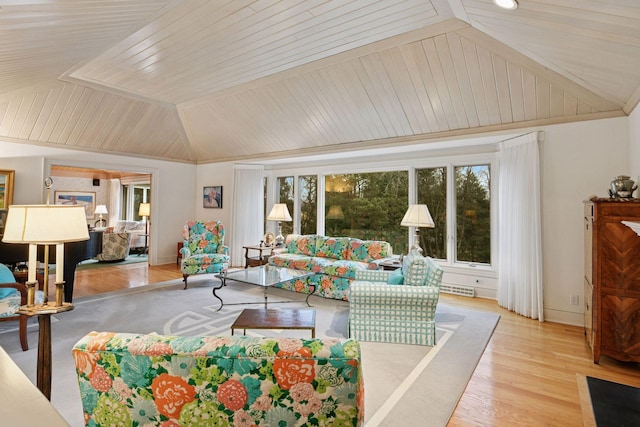 living room featuring baseboards, lofted ceiling, wood ceiling, and wood finished floors