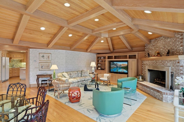 living room featuring wood finished floors, vaulted ceiling with beams, a fireplace, recessed lighting, and wood ceiling