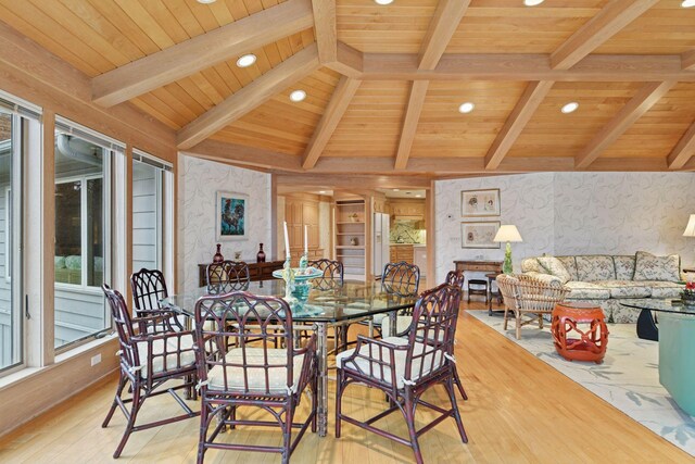 dining space featuring wallpapered walls, light wood-style flooring, vaulted ceiling with beams, recessed lighting, and wood ceiling