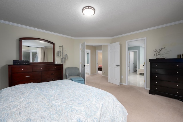 bedroom with baseboards, ornamental molding, a textured ceiling, light colored carpet, and connected bathroom