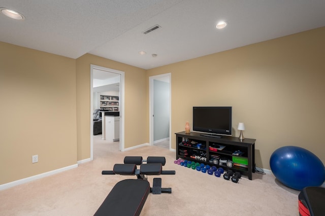 workout room with recessed lighting, baseboards, visible vents, and carpet floors