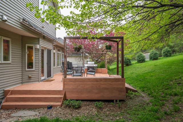 wooden terrace with a yard