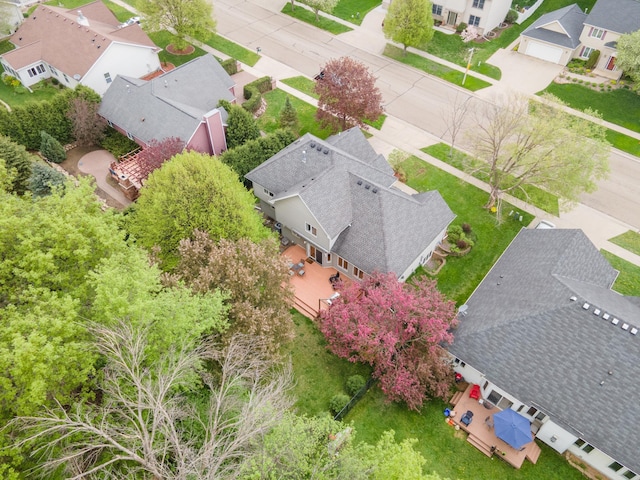 birds eye view of property with a residential view