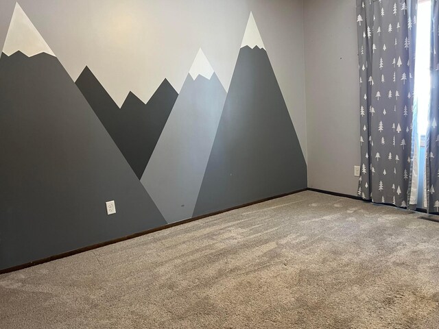 empty room with carpet floors
