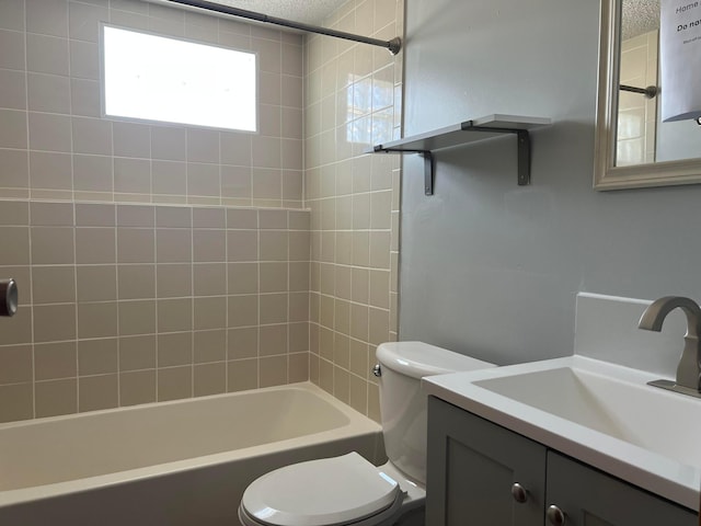 full bathroom with vanity, bathtub / shower combination, and toilet