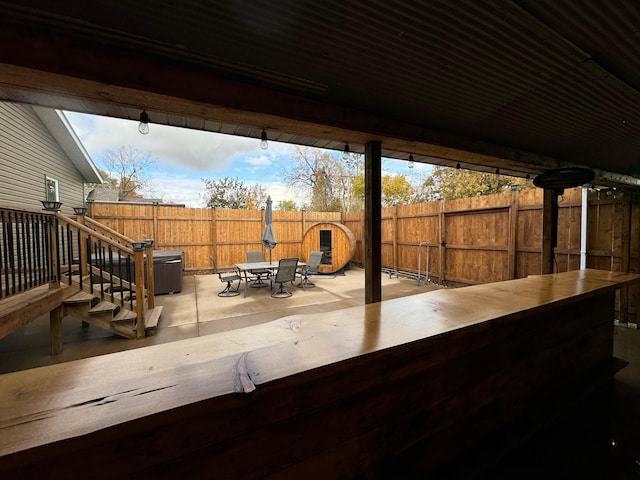 view of patio / terrace with fence