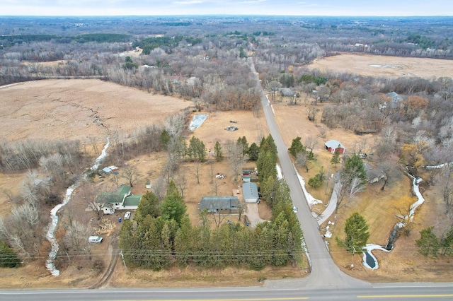 birds eye view of property with a rural view