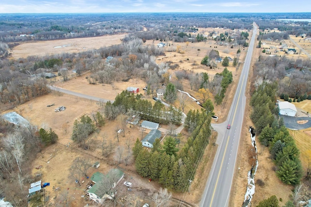 birds eye view of property featuring a rural view