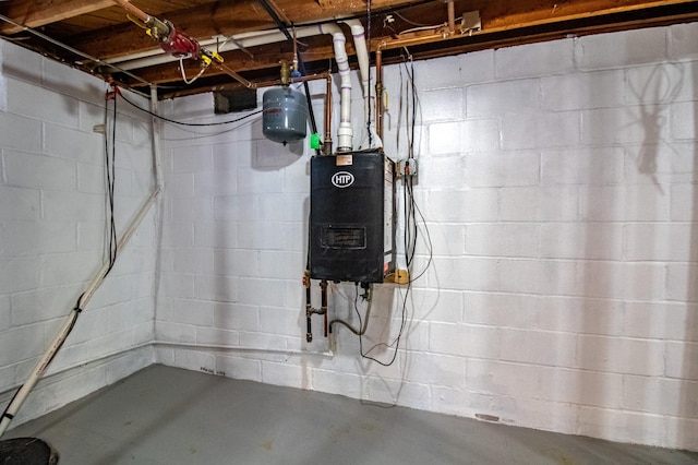 utility room featuring water heater