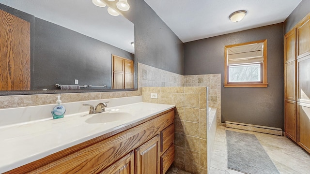 bathroom featuring vanity and baseboard heating