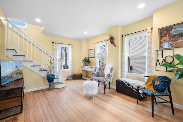 949 9th Ave SE, Rochester, MN 55904 - sitting room featuring wood-type flooring, baseboards, and stairs