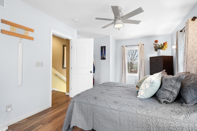 949 9th Ave SE, Rochester, MN 55904 - bedroom featuring wood finished floors, ceiling fan, baseboards, and visible vents