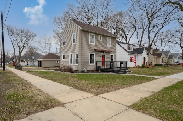 949 9th Ave SE, Rochester, MN 55904 - view of front facade featuring a wooden deck, a residential view, and a front lawn