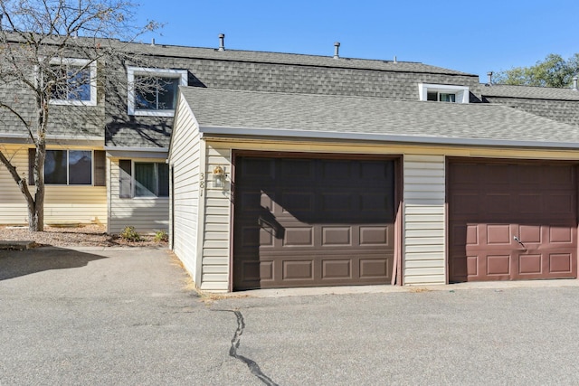 garage featuring driveway