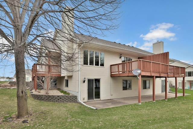 13413 Pine View Pl, Lindstrom, MN 55045 - rear view of house with a chimney, a yard, and a patio area