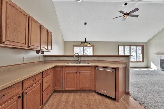 13413 Pine View Pl, Lindstrom, MN 55045 - kitchen with stainless steel dishwasher, a sink, lofted ceiling, a peninsula, and a ceiling fan