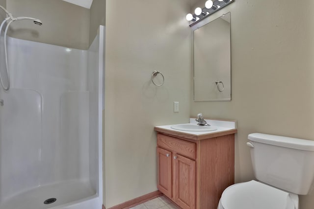 13413 Pine View Pl, Lindstrom, MN 55045 - bathroom featuring a stall shower, baseboards, toilet, tile patterned floors, and vanity