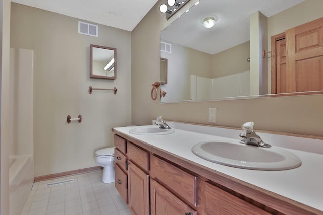 13413 Pine View Pl, Lindstrom, MN 55045 - bathroom featuring baseboards, toilet, double vanity, and tile patterned flooring