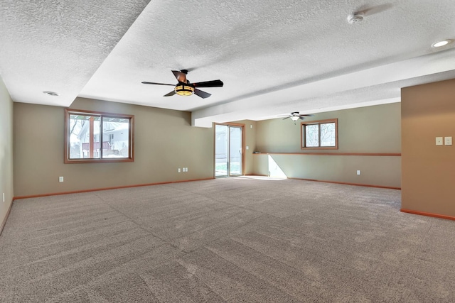 13413 Pine View Pl, Lindstrom, MN 55045 - carpeted empty room featuring a textured ceiling, ceiling fan, baseboards, and a smoke detector