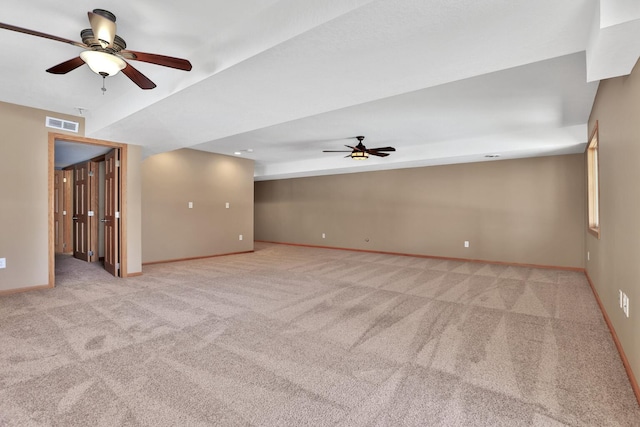 13413 Pine View Pl, Lindstrom, MN 55045 - spare room featuring a ceiling fan, light colored carpet, and baseboards