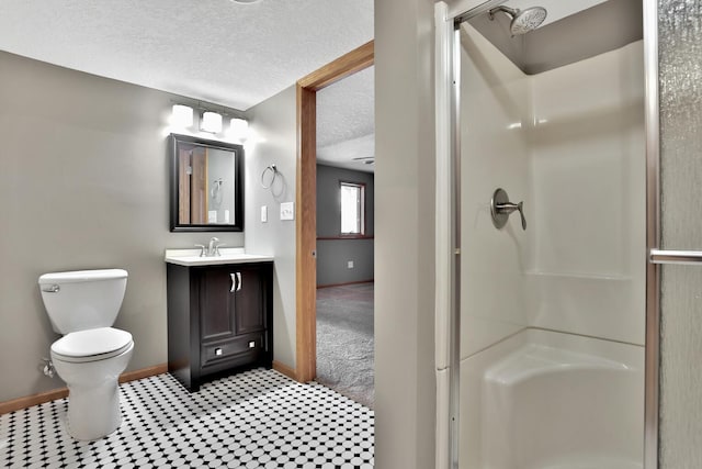 13413 Pine View Pl, Lindstrom, MN 55045 - bathroom with a textured ceiling, a stall shower, baseboards, toilet, and vanity