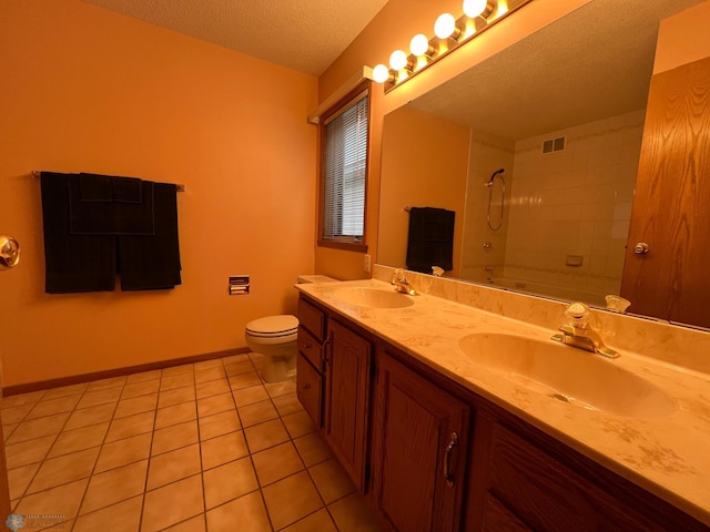 full bath with tile patterned flooring, tub / shower combination, visible vents, and a sink