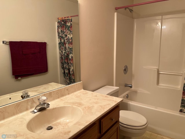 bathroom with shower / bathtub combination with curtain, toilet, and vanity