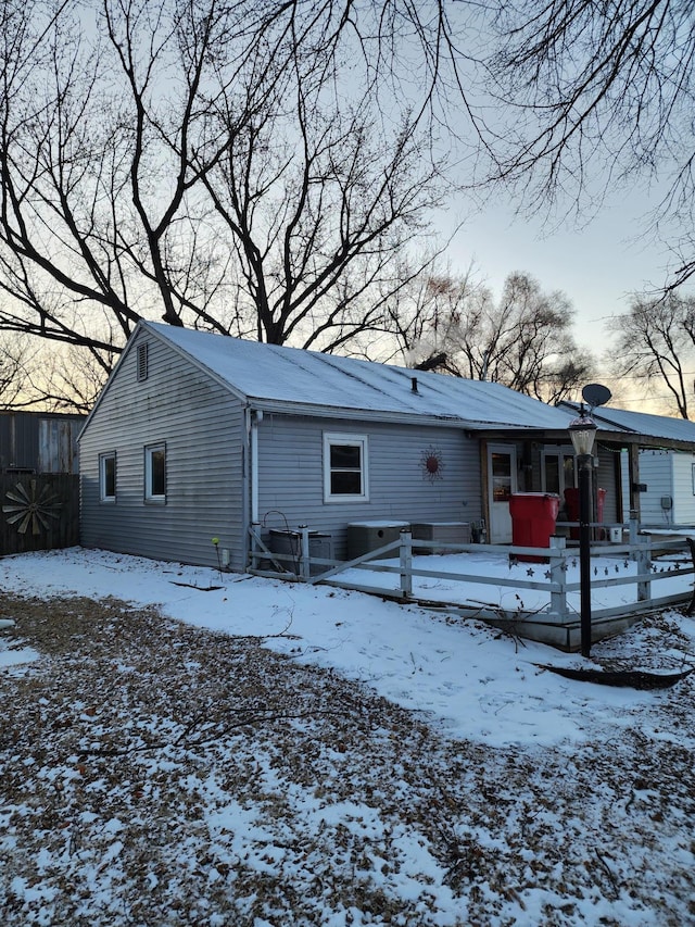 view of snow covered house