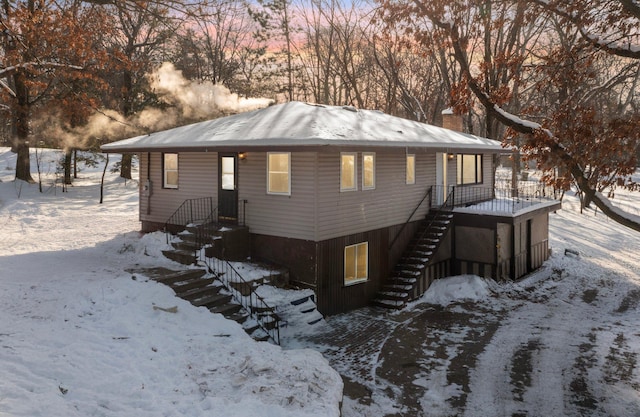 view of front of property featuring a chimney