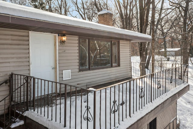 view of snow covered deck