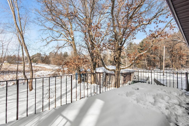 view of snow covered deck