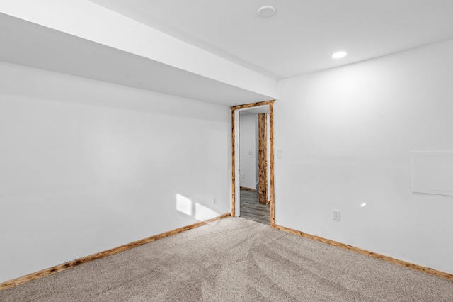 unfurnished room with carpet, baseboards, and recessed lighting