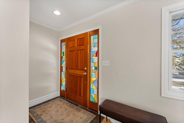 entryway with recessed lighting, baseboards, and crown molding