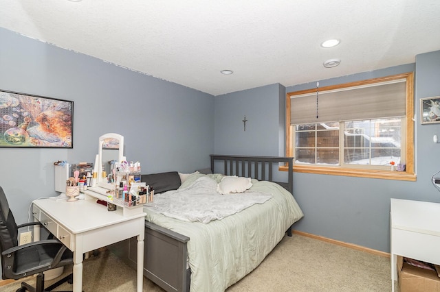 bedroom featuring recessed lighting, light carpet, and baseboards