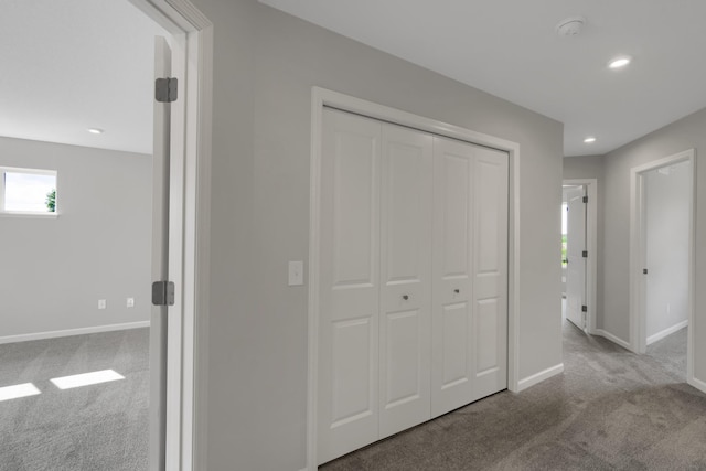 corridor with recessed lighting, baseboards, and carpet floors