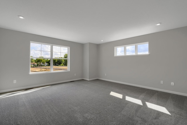 carpeted empty room with recessed lighting and baseboards