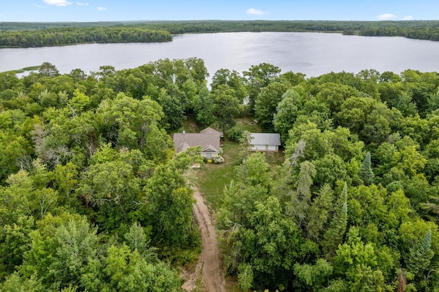 aerial view with a forest view and a water view