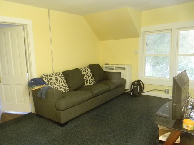 living room with radiator heating unit, heating unit, carpet, and vaulted ceiling