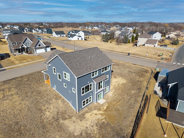 drone / aerial view with a residential view