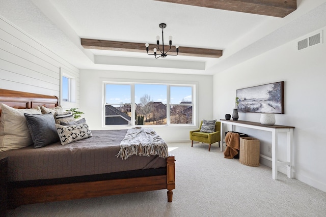 bedroom featuring visible vents, baseboards, carpet, beamed ceiling, and an inviting chandelier