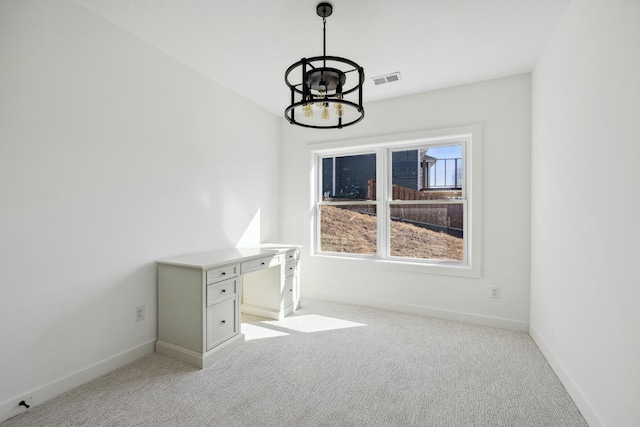 interior space featuring visible vents, a notable chandelier, light colored carpet, and baseboards