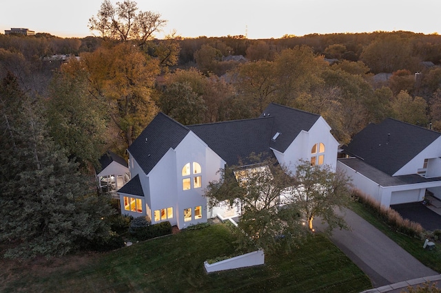 aerial view featuring a view of trees