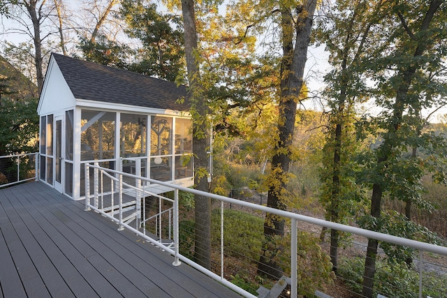 wooden terrace with a sunroom